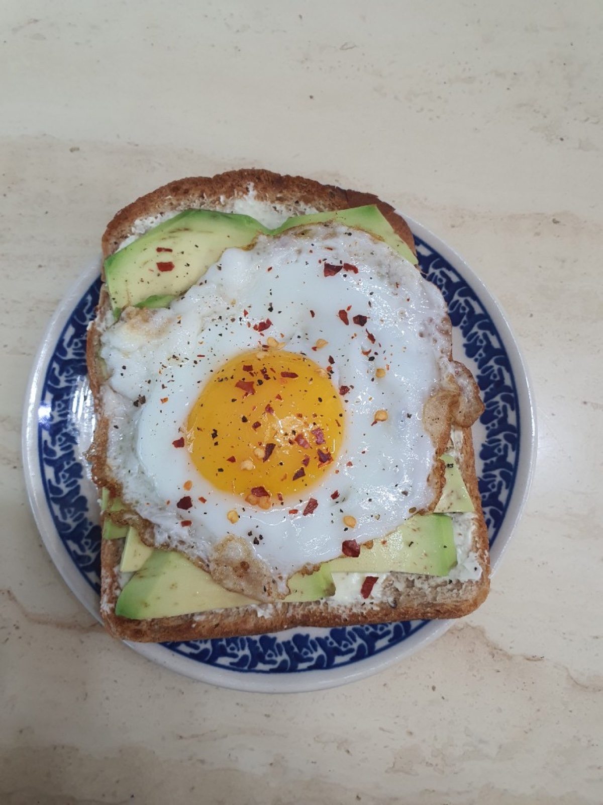 Avocado toast with a fried egg